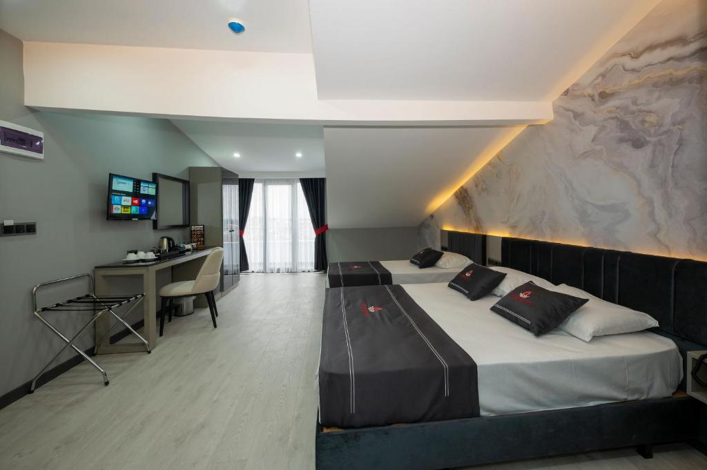 Deluxe Triple Room